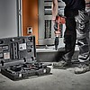 Электроинструмент RIDGID RE 60 с насадкой для пробивки отверстий диаметром до 63,5 мм в листах из мягкой стали толщиной до 3 мм